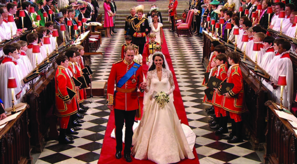 In this image taken from video, Britain's Prince William, left, and his wife, Kate, the Duchess of Cambridge, walk down the aisle together at Westminster Abbey for the Royal Wedding in London on Friday, April, 29, 2011. (AP Photo/APTN) EDITORIAL USE ONLY NO ARCHIVE PHOTO TO BE USED SOLELY TO ILLUSTRATE NEWS REPORTING OR COMMENTARY ON THE FACTS OR EVENTS DEPICTED IN THIS IMAGE
