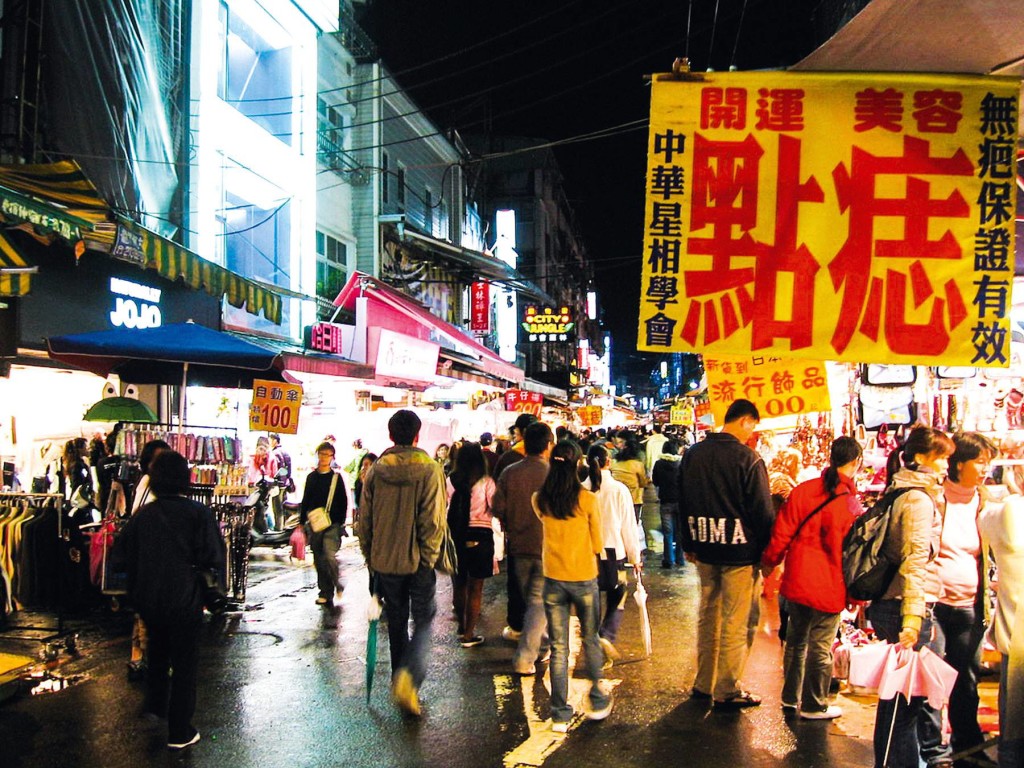 Money can't buy happiness but it can help you navigate the street markets of Taipei. Photo by commons.wikipedia.org