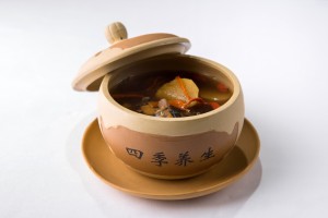 Crystal Dragon.Double-boiled black chicken with wild yam in ginseng soup