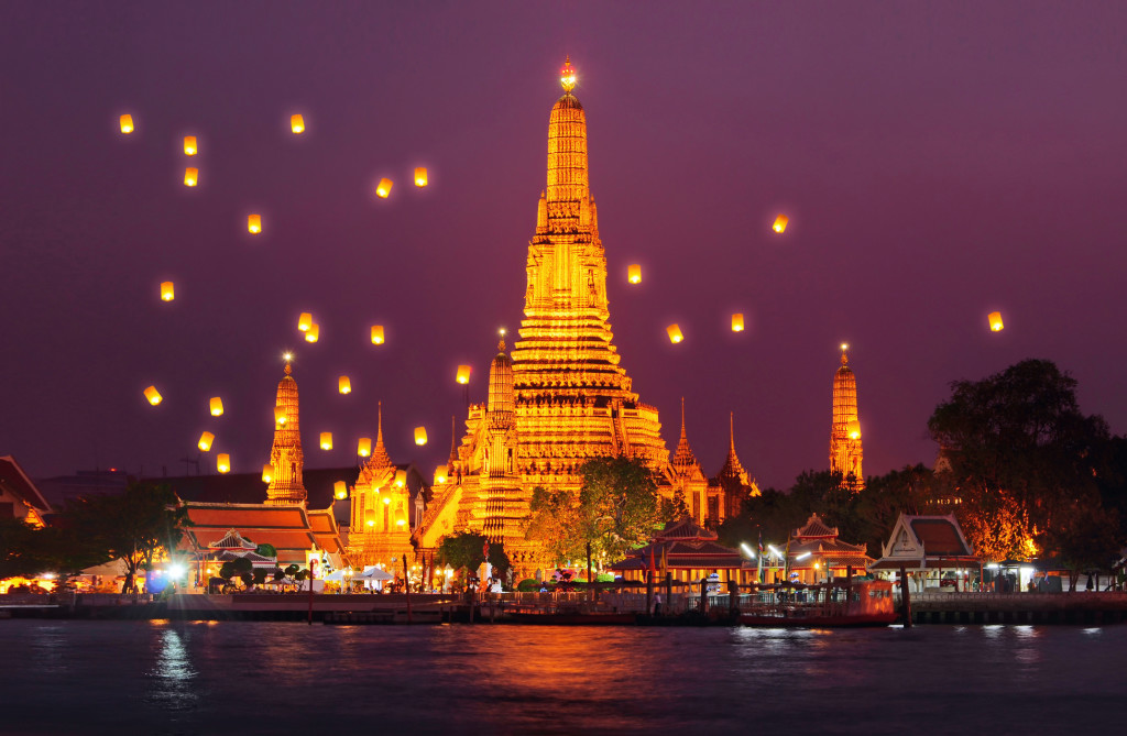 See the Wat Arun in Bangkok by flying SIA for as low as  USD235