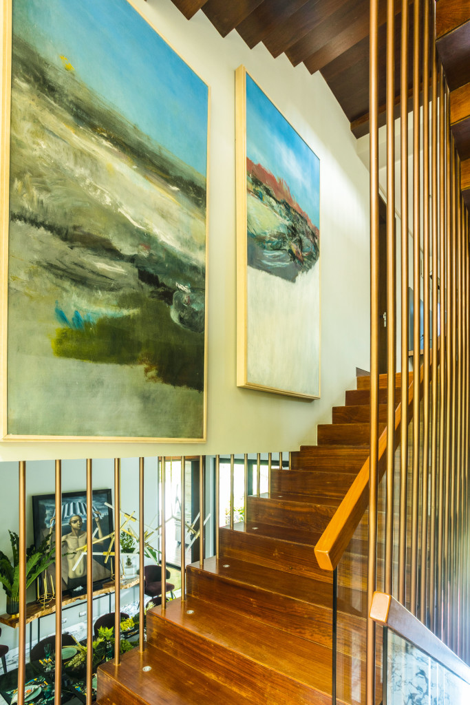 Calubayan's series consisting of five-huge paintings fit perfectly of two walls that make up the stairwell.