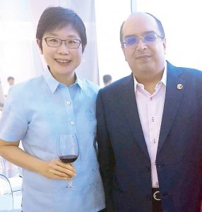 Singaporean Ambassador Kok Li Peng and Rex Daryanani