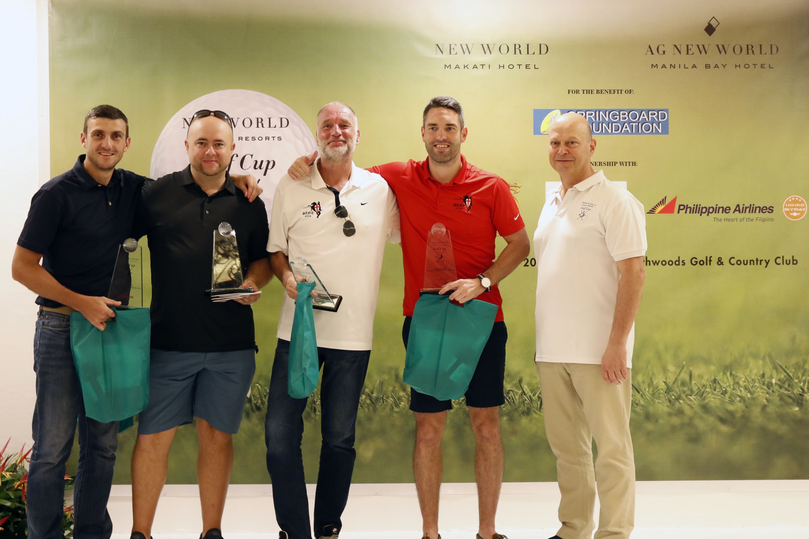 (FROM LEFT) Golf Cup 3 champions Steve Borril, Michael Denison, Tony Kennerly, and Phil Connolly with New World Makati Hotel general manager Farid Schoucair 