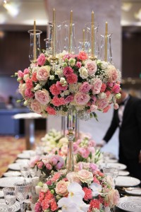 Table setting featuring multi-colored roses and carnations by Michael Ruiz