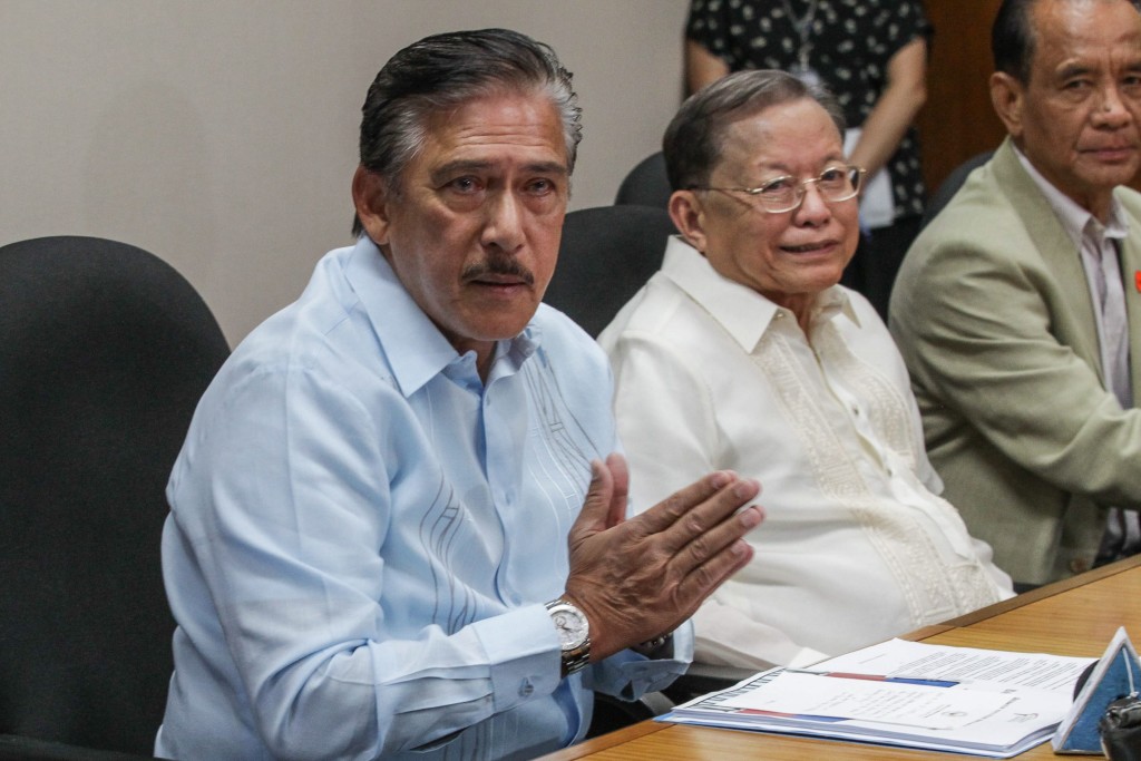 Senate President Vicente Sotto III gesture during the turn over of the Bayanihan Federalism draft from former Supreme Court justice and Consultative Committee Chairman Reynato Puno together with the former Senate President Aquilino Pimentel Jr. and other members of the committee at the conference hall of the office of the Senate President in Pasay city yesterday. Photo by Geremy Pintolo