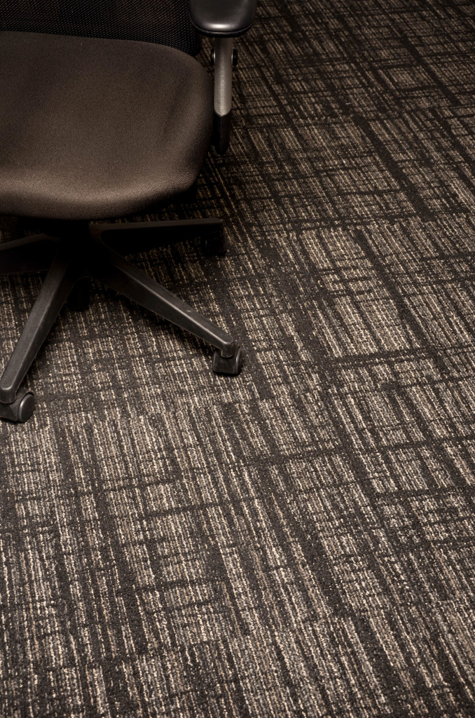 Tajima's seamless, fire retardant carpet tiles are hit for homes and even offices