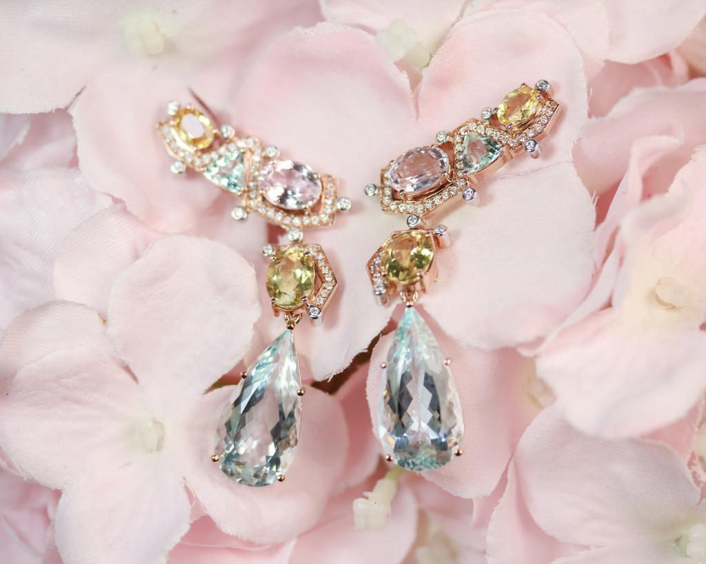 Jessamine Earrings (pictured above le ) 14k white gold earrings with 4.14 carats  re opal and 1.33 carats diamonds