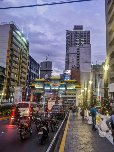 Manila transforming into a city of lights by dusk