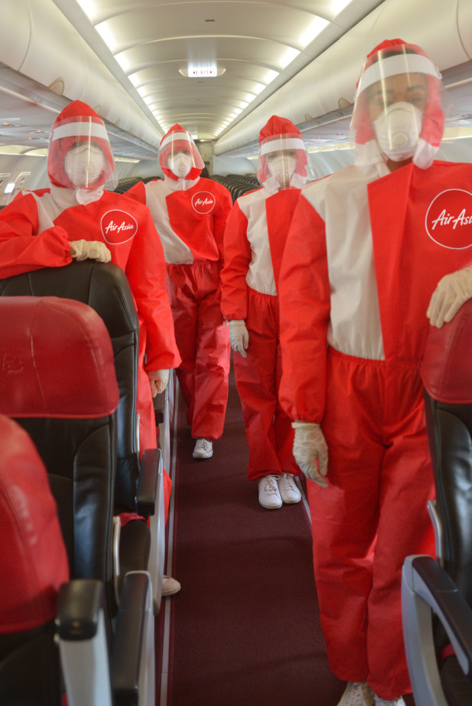 AirAsia Allstar cabin crews wearing their PPEs