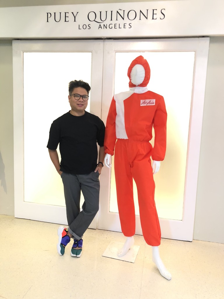 Puey Quinones with his designed AirAsia PPE