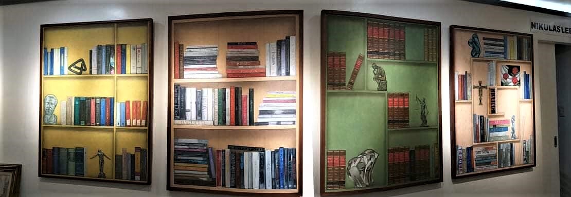 Nikulas Lebajo turns ordinary bookshelf “portraits” into extraordinary ones